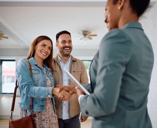 Insurance adviser with clients